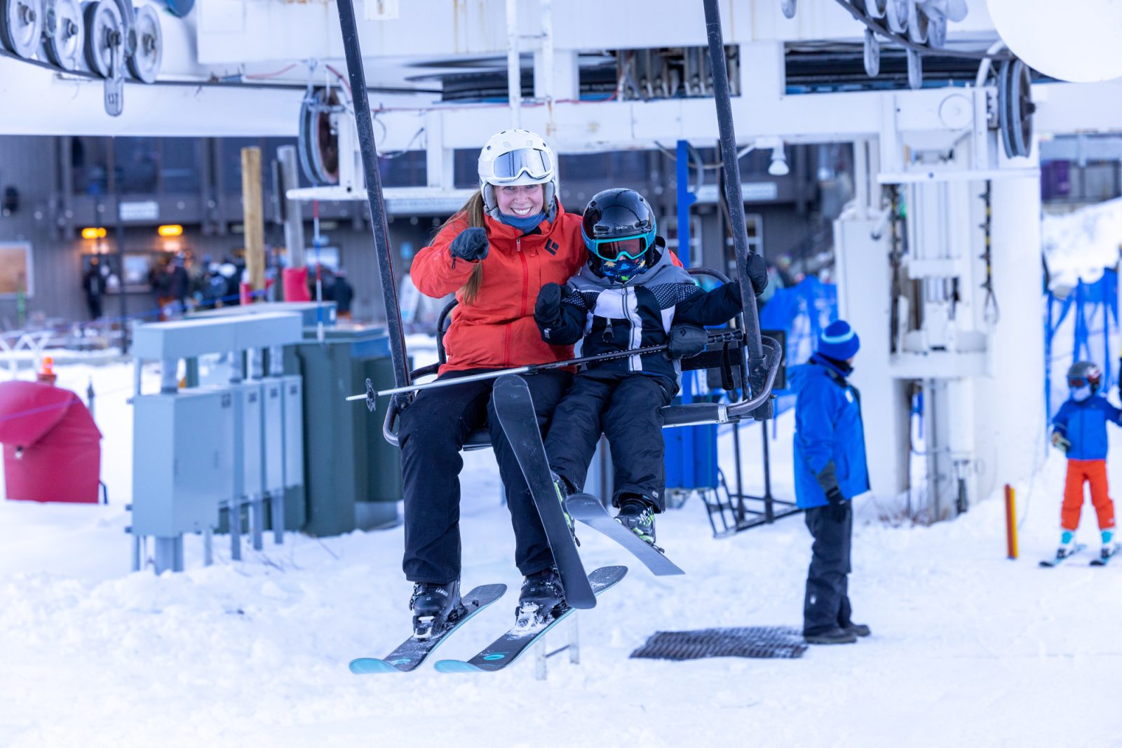 Mother And Son On Coach Chairlift Early Season At Bogus Basin - Photo By Luke Tokunaga