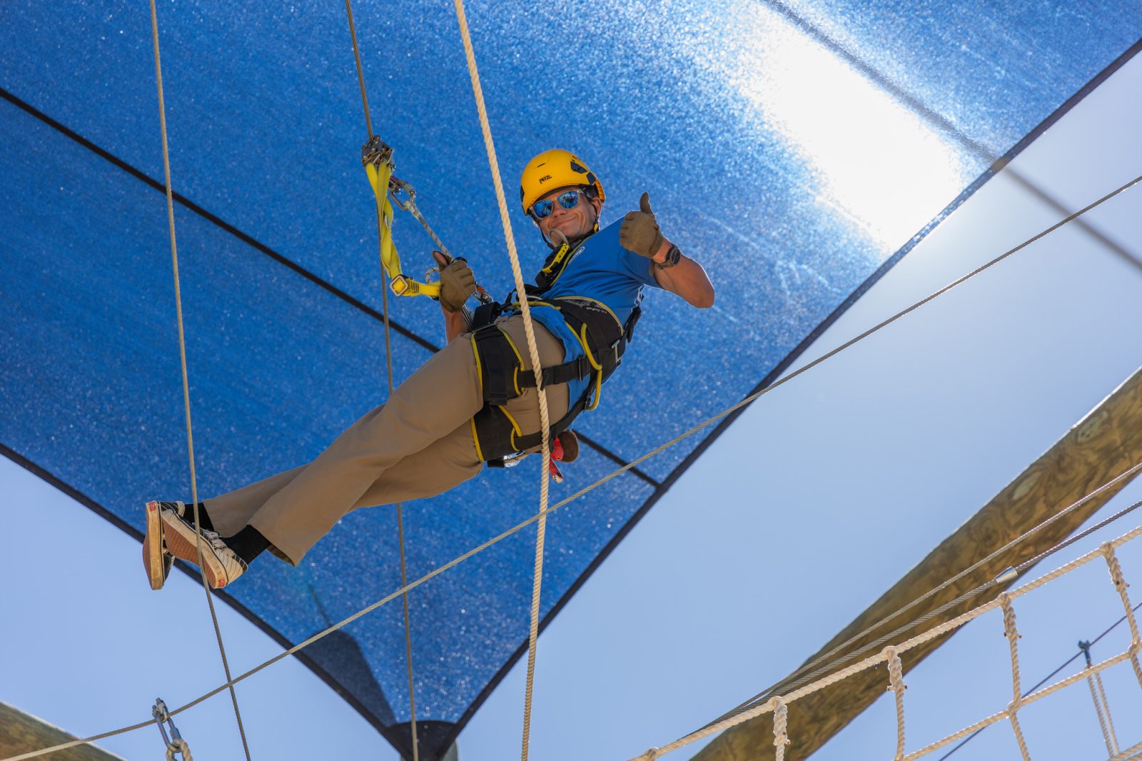 Employee On Mine Shaft Challenge Course At Bogus Basin - Photo By Cassidy Carter