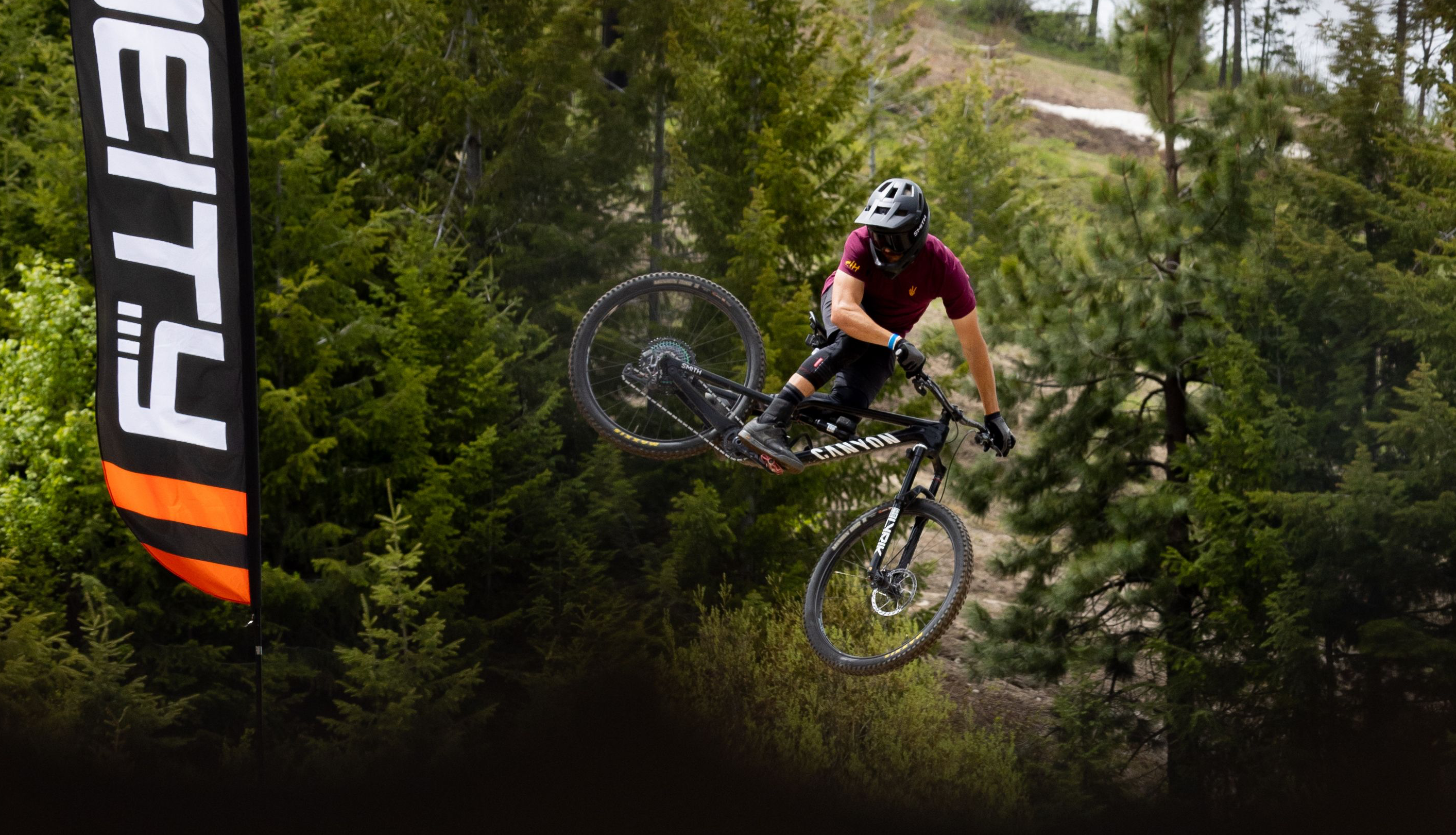 Male Mountain Biker On Canyon Bike Doing Trick At Whip Off Boise Mountain Bike Festival Summer 2025 At Bogus Basin Mountain Recreation Area 2827px2763px