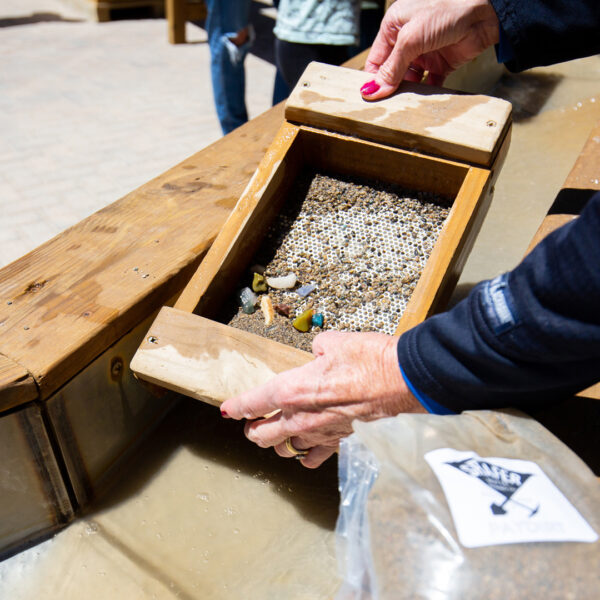 Close Up Hands Sifting Through Dirt With Gems At The Shafer Butte Mining Co Summer 2021 At Bogus Basin Mountain Recreation Area Photo By Luke Tokunaga 1920px1080px