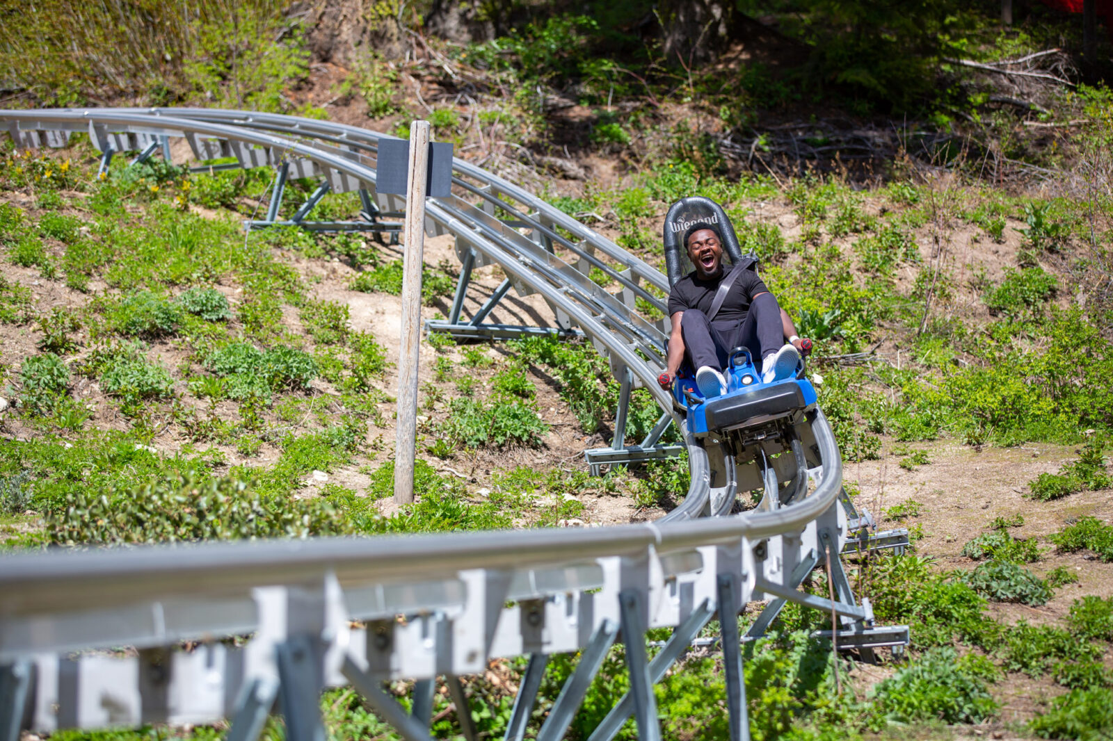 Group Sales Smiling Guest Riding The Glade Runner Moutian Coaster At Bogus Basin 05-2021 Photo By Luke Tokunaga 2048x 1365