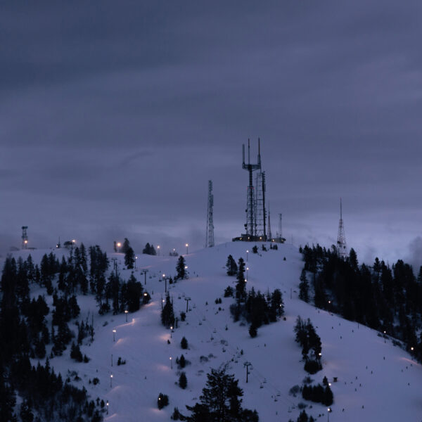 Deer Point Cell Towers At Twilight With Lit Up Runs Night Skiing Operations At Bogus Basin Winter 2024 At Bogus Basin Mountain Recreation Area Photo By Cassidy Carter 1920px1080px