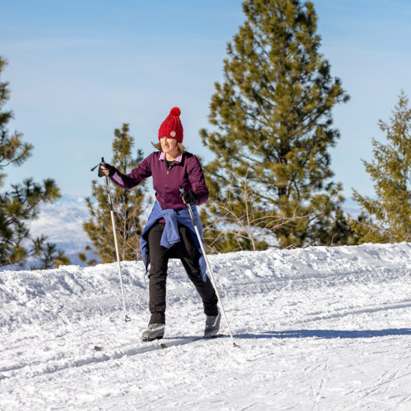 Adult Female Nordic Skier On Skate Skis Enjoying The Frontier Point Trail System Winter 2022 At Bogus Basin Mountain Recreation Area Photo By Luke Tokunaga 1920px1080px