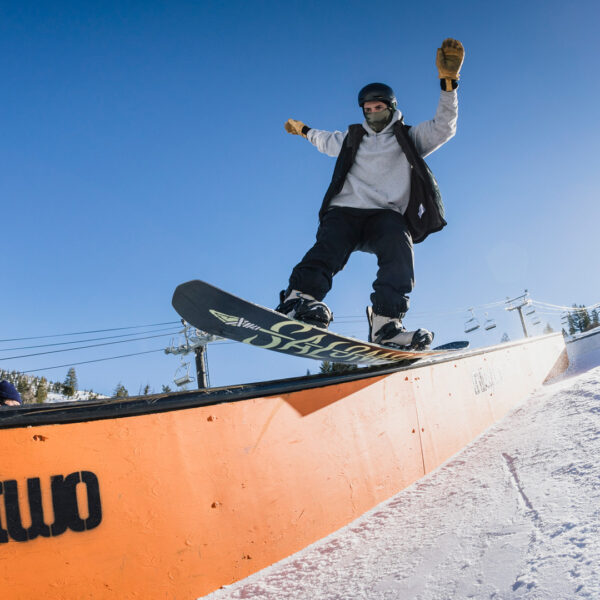 Adult Male Snowboarder Fifty Fifty Tailpress On Down Handrail In Bogus Basin Terrain Parks Fisheye Closeup From Below Winter 2020 At Bogus Basin Mountain Recreation Area Photo By John Webster 1920px1080px