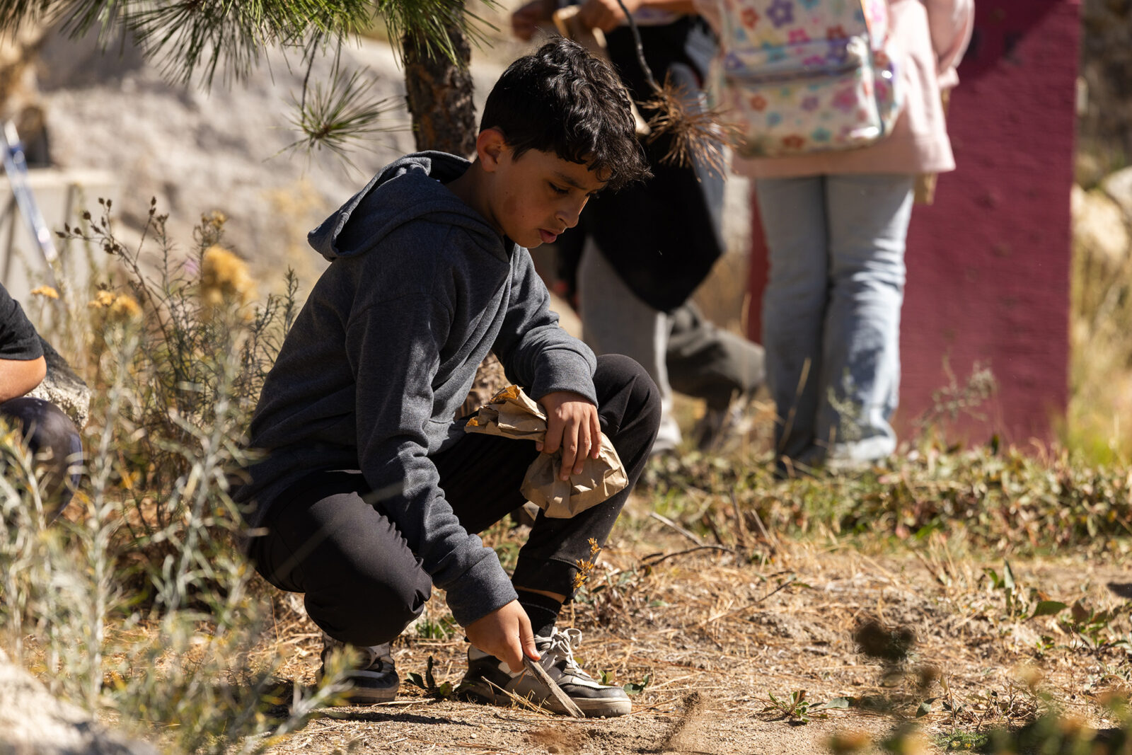 Environmental Education Fall Field Trip Student Planting Native Seeds Summer 2025 At Bogus Basin 09 2025 Photo By Cassidy Carter 2084x 1390.jpg