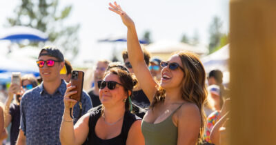 Featured Image Two Females Smiling And Dancing InCrowdOfPeople During Music On The Mountain Summer 2025 At Bogus Basin _ 07 2025 Photo By CassidyCarter 1200px 630px